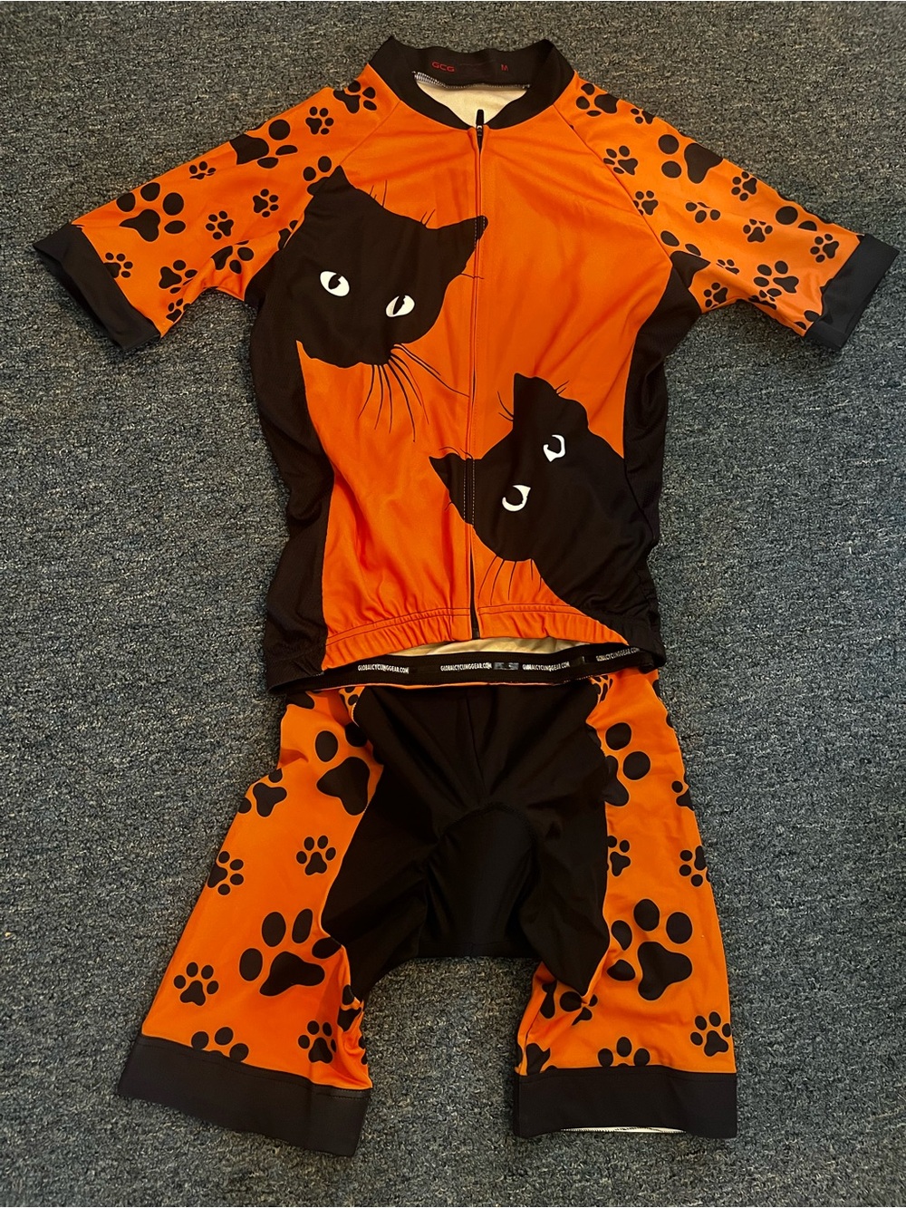 Global Cycling Gear Orange & Black Cat Paw Cycling Jersey and Shorts set size M